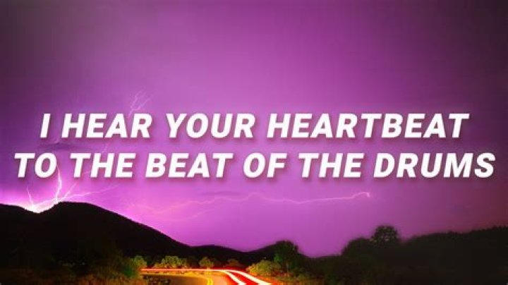 And hear the beat of the drum drum drum lyrics