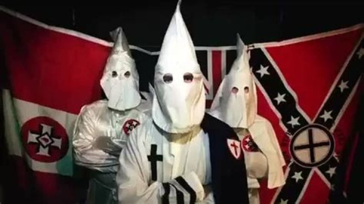 I am grand wizard man born leader of the ku klux klan big sheets and pointy hats beating niggas down with a baseball bat lyrics