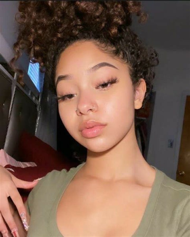 Thick lightskin from l.a. abd she got a lil belly lyrics