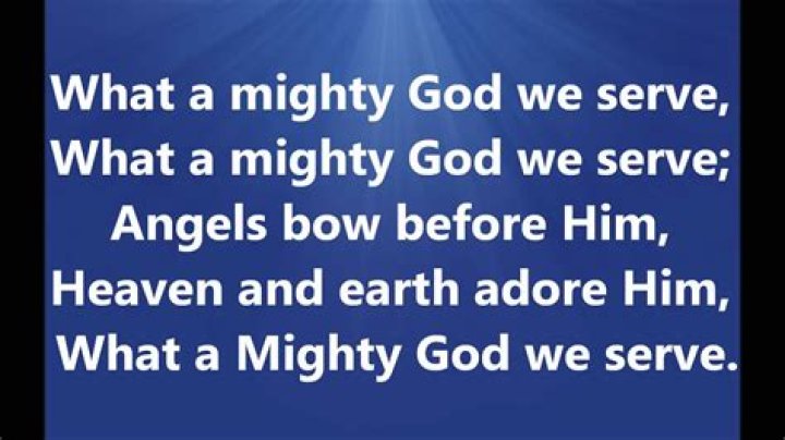 What a mighty god we serve, heaven and earth adore him, angels bow before him lyrics